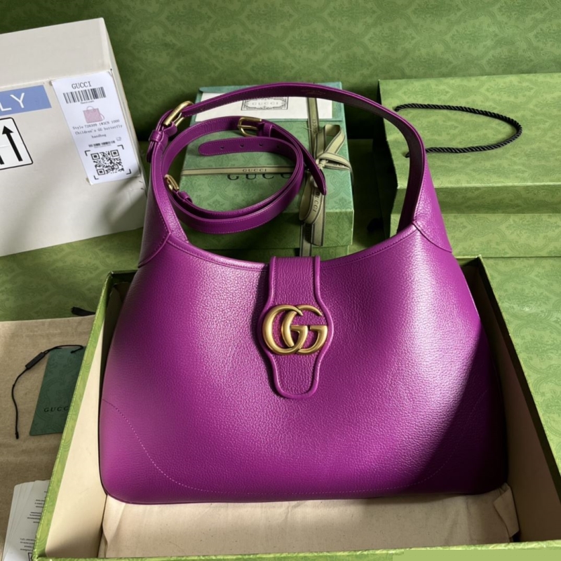 G*u*i top handle bags